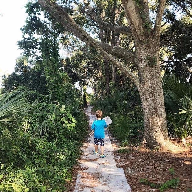 kid on foot path