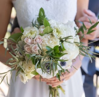 bouquet of flowers being held by a bride