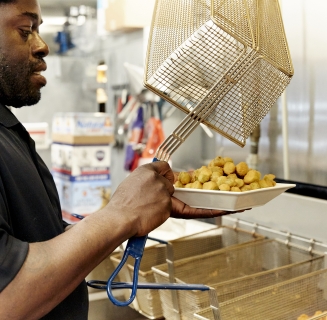 man making food