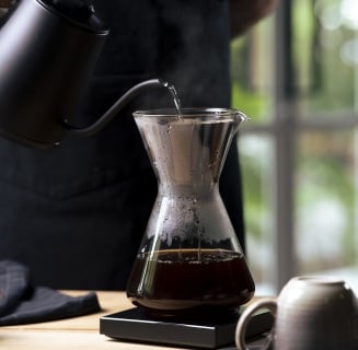 person pouring coffee