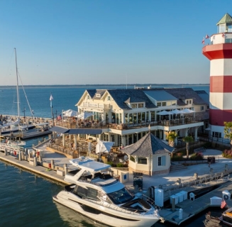 Quarterdeck venue nestled on the water near a lighthouse