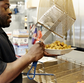 man making food