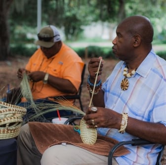 two men basket weaving