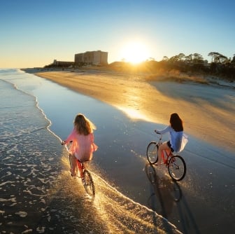 two people biking