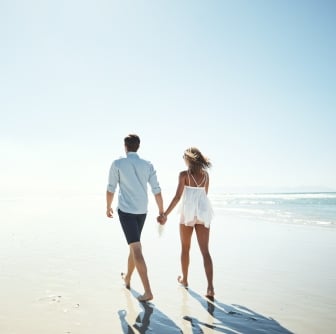 couple walking on a beach