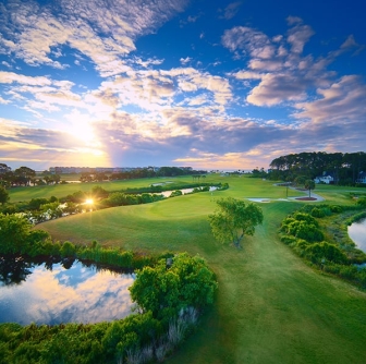 aerial of Palmetto Dunes Jones course with sun peeking through the clouds