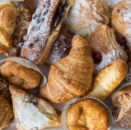 freshly made baked goods laid out on a table