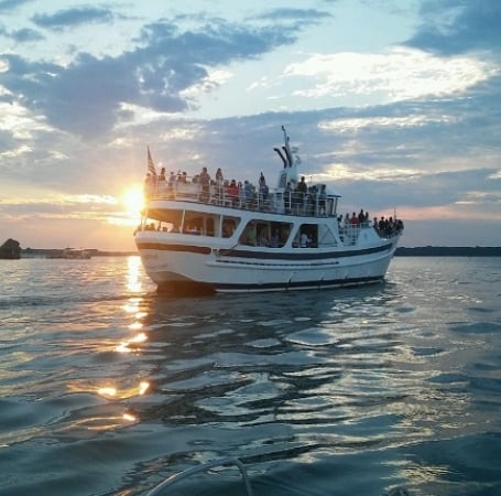 Boat on the water with people on it