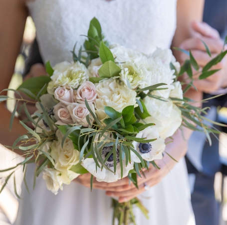 bouquet of flowers being held by a bride