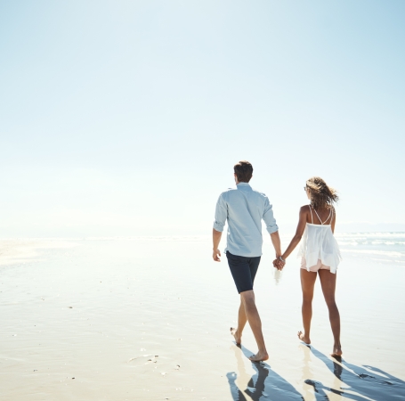 couple walking on a beach