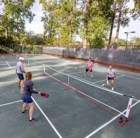 group playing pickleball