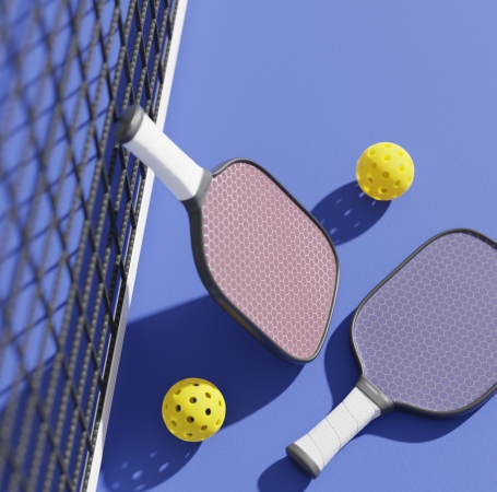 pickleball racquet and balls