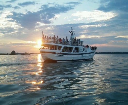 Boat on the water with people on it