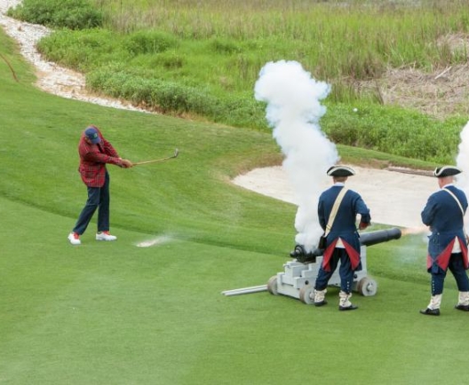 man taking golf swing