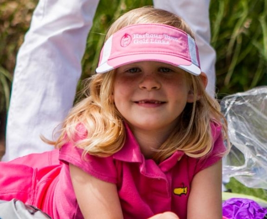 child laying on ground