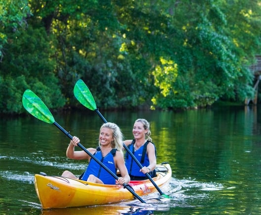 two people in kayaks
