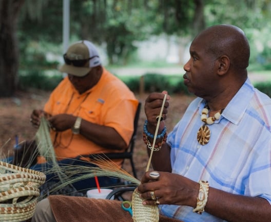 two men basket weaving