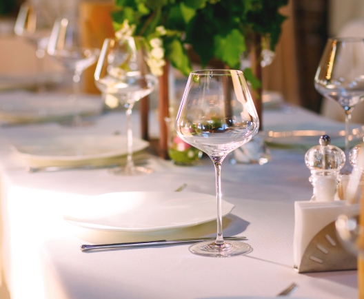 wine glass on a table setting