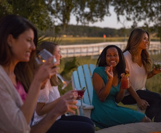 group of women drinking wine