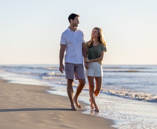 couple on beach walk 