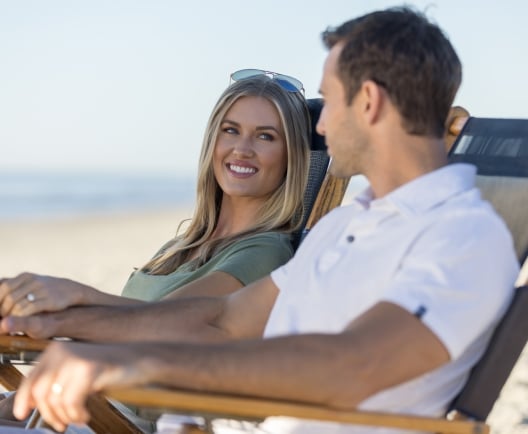 couple sitting on the beach
