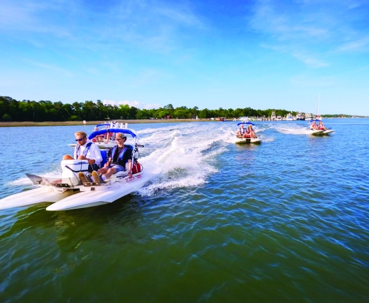 People in peddle boats