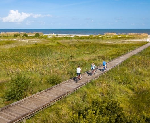 people biking on a train