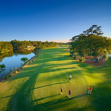 People teeing off at Palmetto Dunes