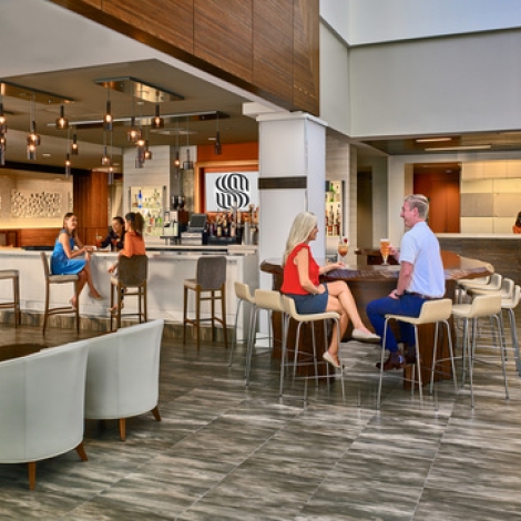 groups of people dining in the lobby bar