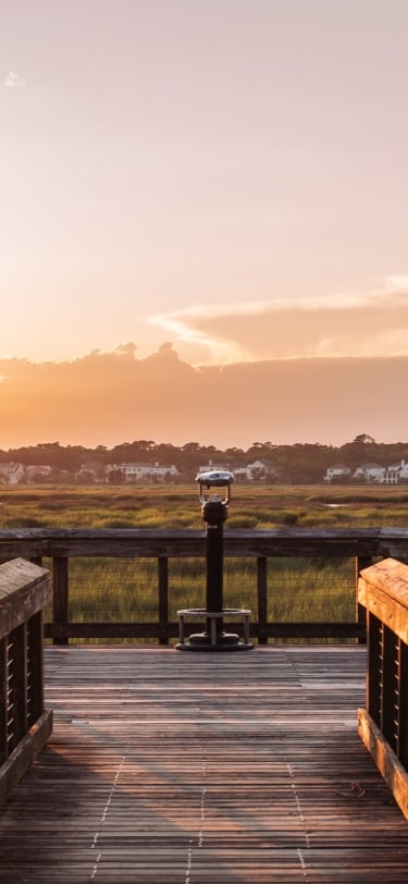 boardwalk overlooping sunset