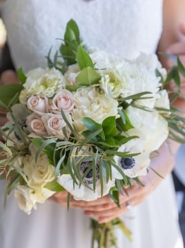 bouquet of flowers being held by a bride