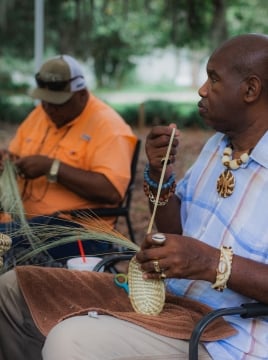 two men basket weaving