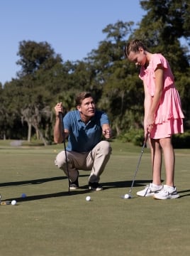 Family golfing