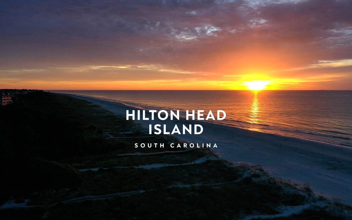 hilton head island beach with sunset and logo overlay